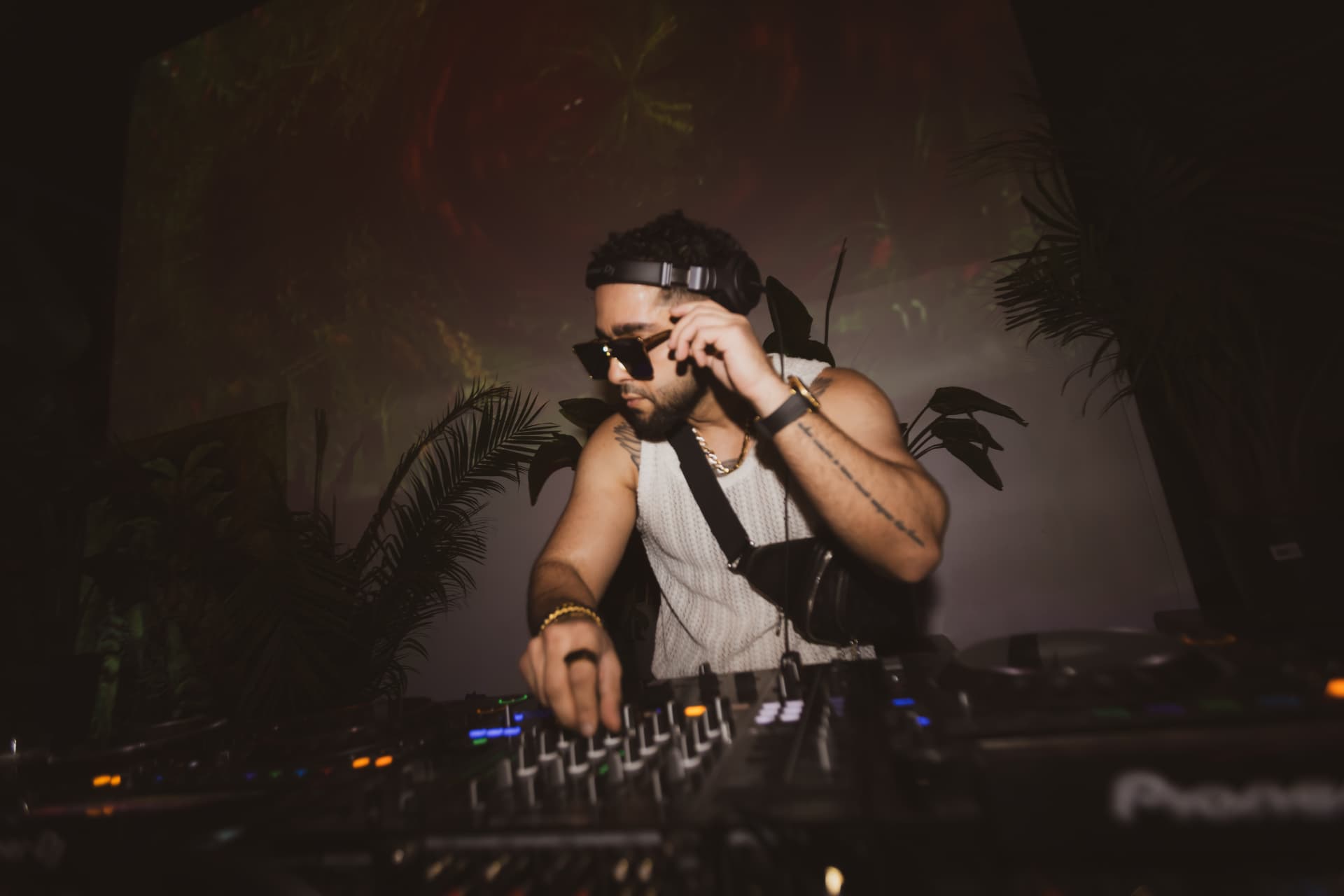 FARZY adjusting his shades mid-mix